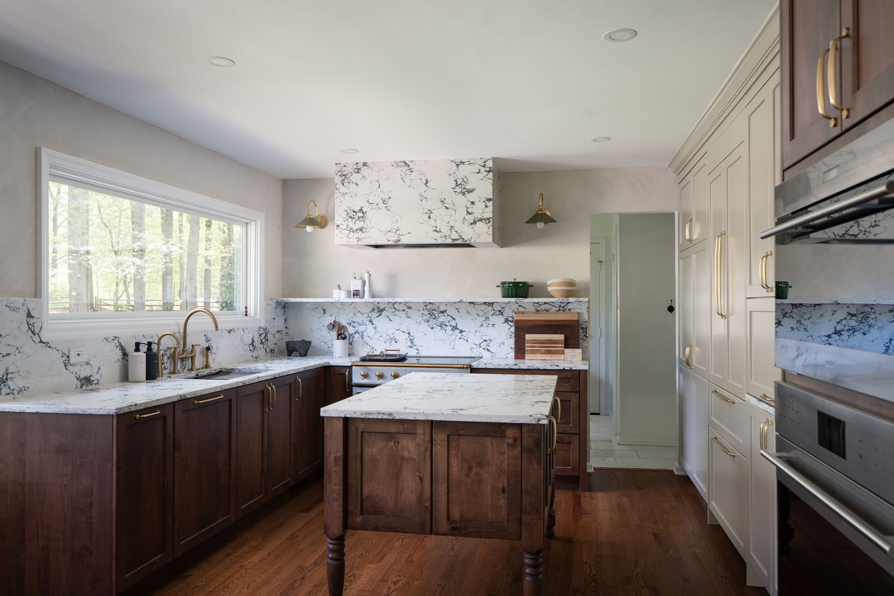 Custom kitchen remodel with walnut cabinetry and marble backsplash in Bethesda MD